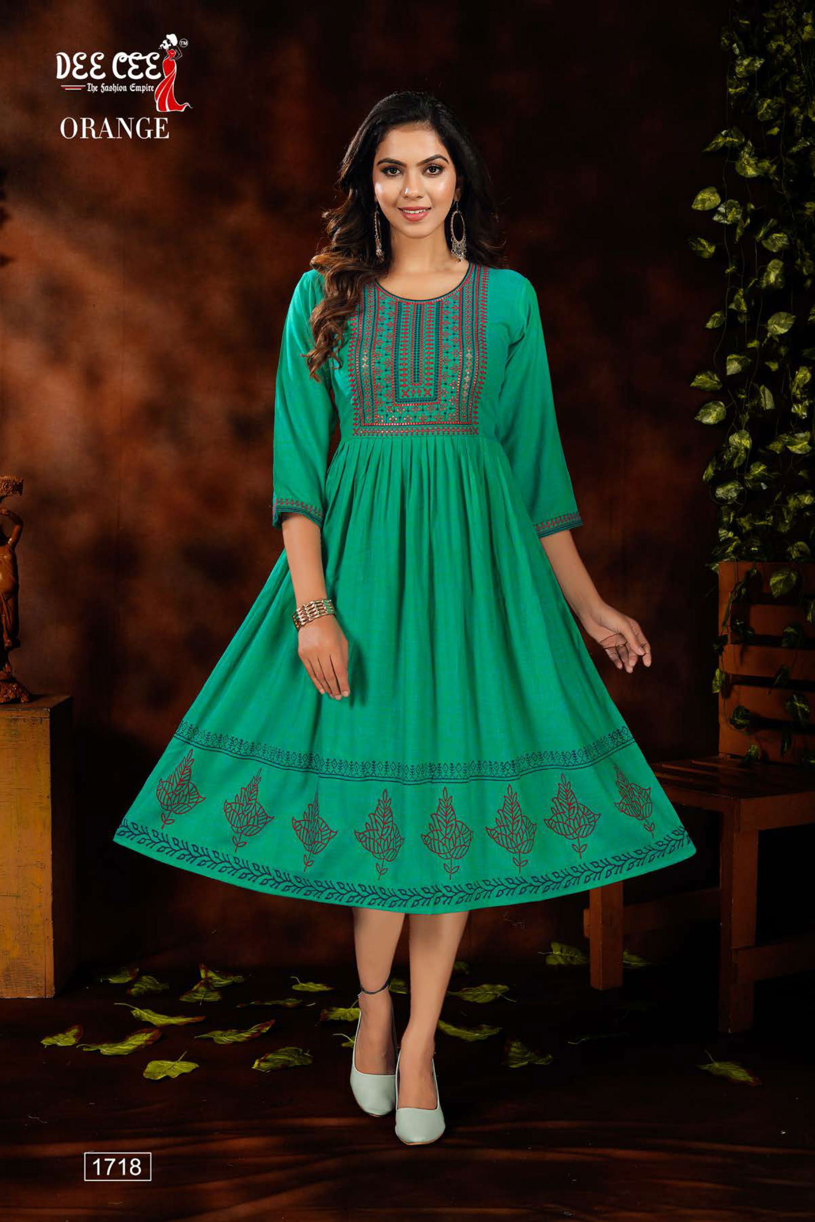 Dee Cee Orange Rayon Fancy Wear Designer Latest Kurtis Collection